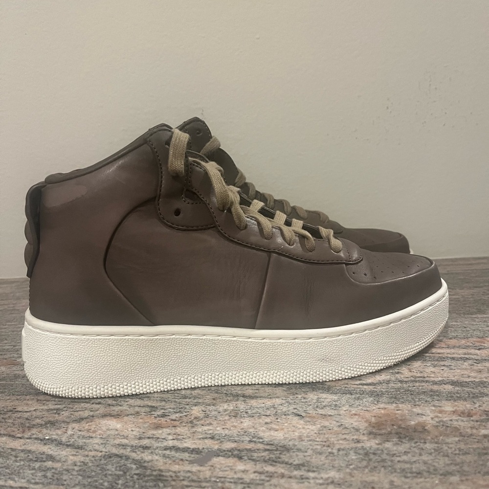 Olive brown leather Celine high-top sneakers with rubber soles